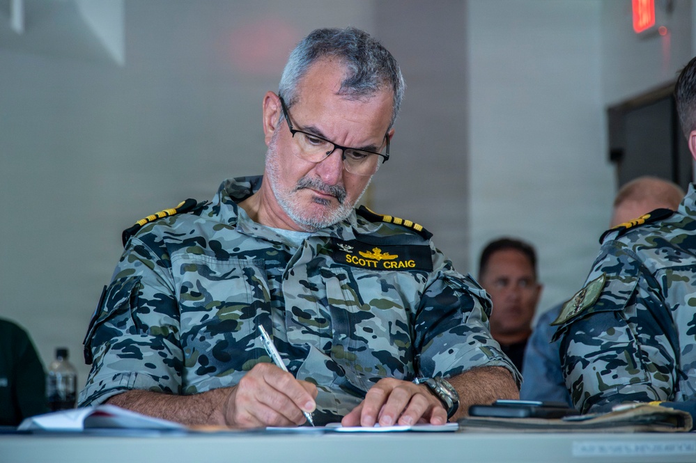 Partner nations participate in an Area Maritime Security Training and Exercise Program tabletop exercise during RIMPAC 2026