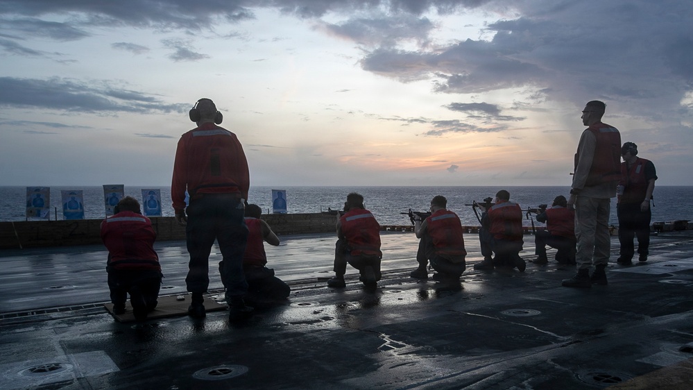 USS Tripoli Conducts A Sunrise Gun Shoot