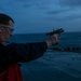 USS Tripoli Conducts A Sunrise Gun Shoot