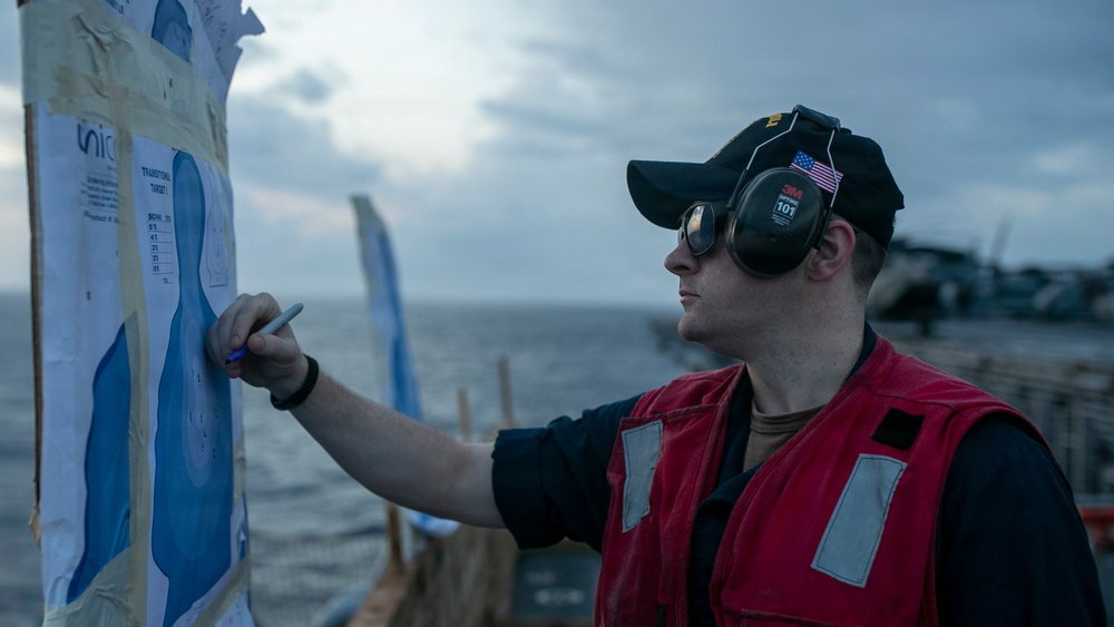 USS Tripoli Conducts A Sunrise Gun Shoot