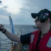 USS Tripoli Conducts A Sunrise Gun Shoot