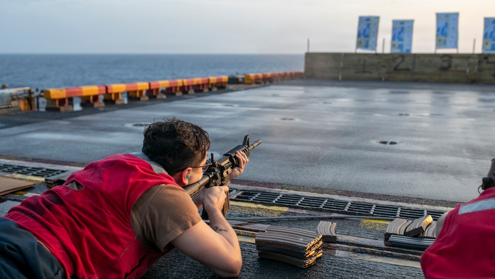 USS Tripoli Conducts A Sunrise Gun Shoot