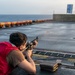 USS Tripoli Conducts A Sunrise Gun Shoot