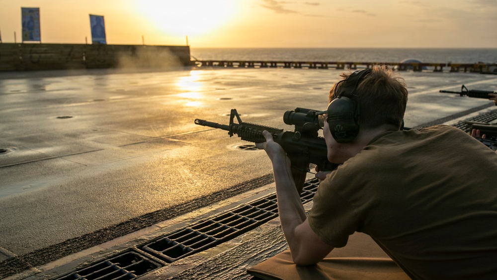 USS Tripoli Conducts A Sunrise Gun Shoot