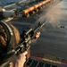 USS Tripoli Conducts A Sunrise Gun Shoot
