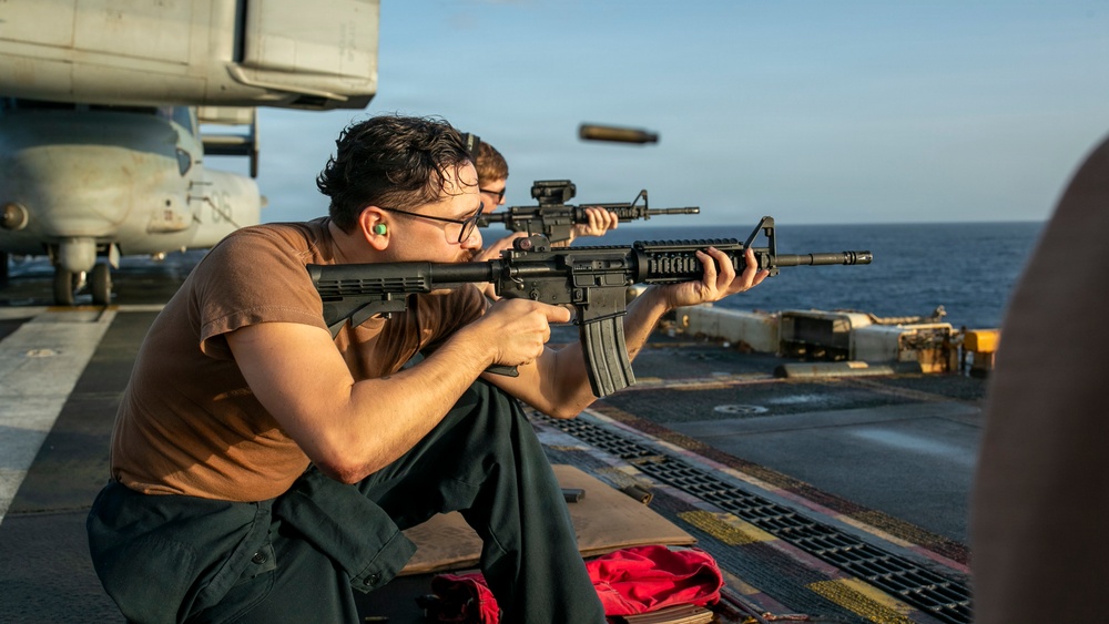 USS Tripoli Conducts A Sunrise Gun Shoot