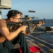 USS Tripoli Conducts A Sunrise Gun Shoot