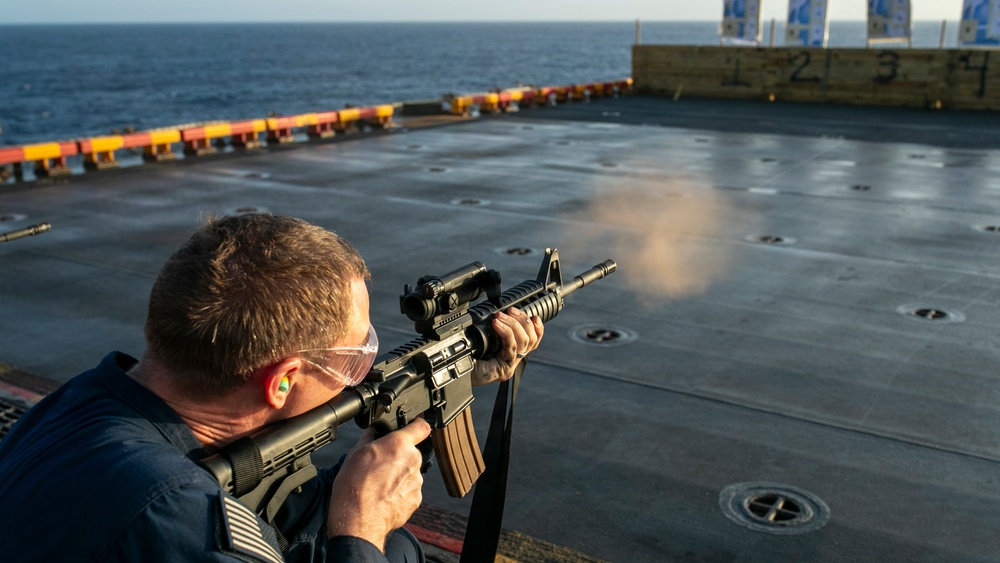 USS Tripoli Conducts A Sunrise Gun Shoot