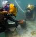 Multinational Navy divers work together during a salvage training at RIMPAC 26
