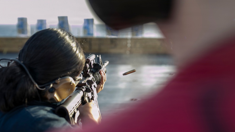 USS Tripoli Conducts A Sunrise Gun Shoot