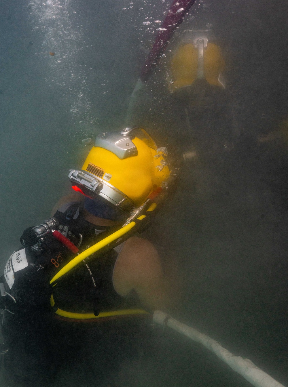 Multinational Navy divers work together during a salvage training at RIMPAC 26