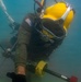 Multinational Navy divers work together during a salvage training at RIMPAC 26