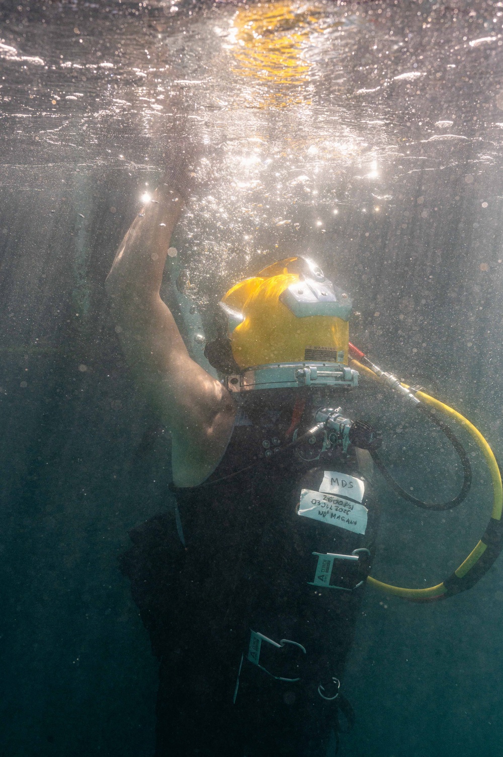 Multinational Navy divers work together during a salvage training at RIMPAC 26