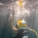 Multinational Navy divers work together during a salvage training at RIMPAC 26