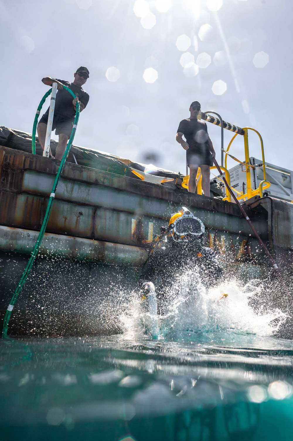 Multinational Navy divers work together during a salvage training at RIMPAC 26