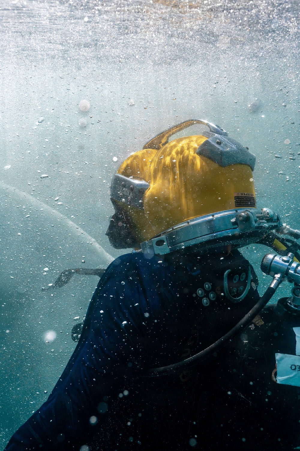 Multinational Navy divers work together during a salvage training at RIMPAC 26