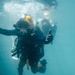 Multinational Navy divers work together during a salvage training at RIMPAC 26