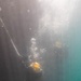 Multinational Navy divers work together during a salvage training at RIMPAC 26