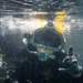Multinational Navy divers work together during a salvage training at RIMPAC 26