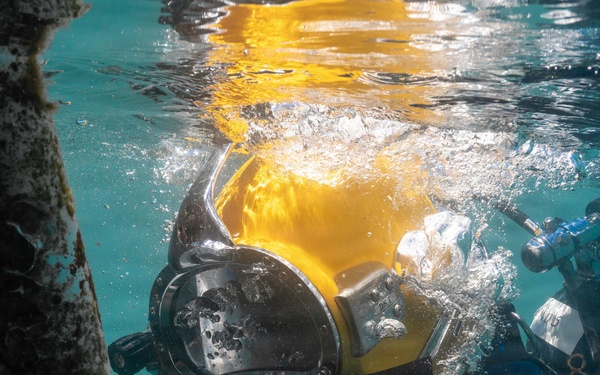 Multinational Navy divers work together during a salvage training during RIMPAC 26