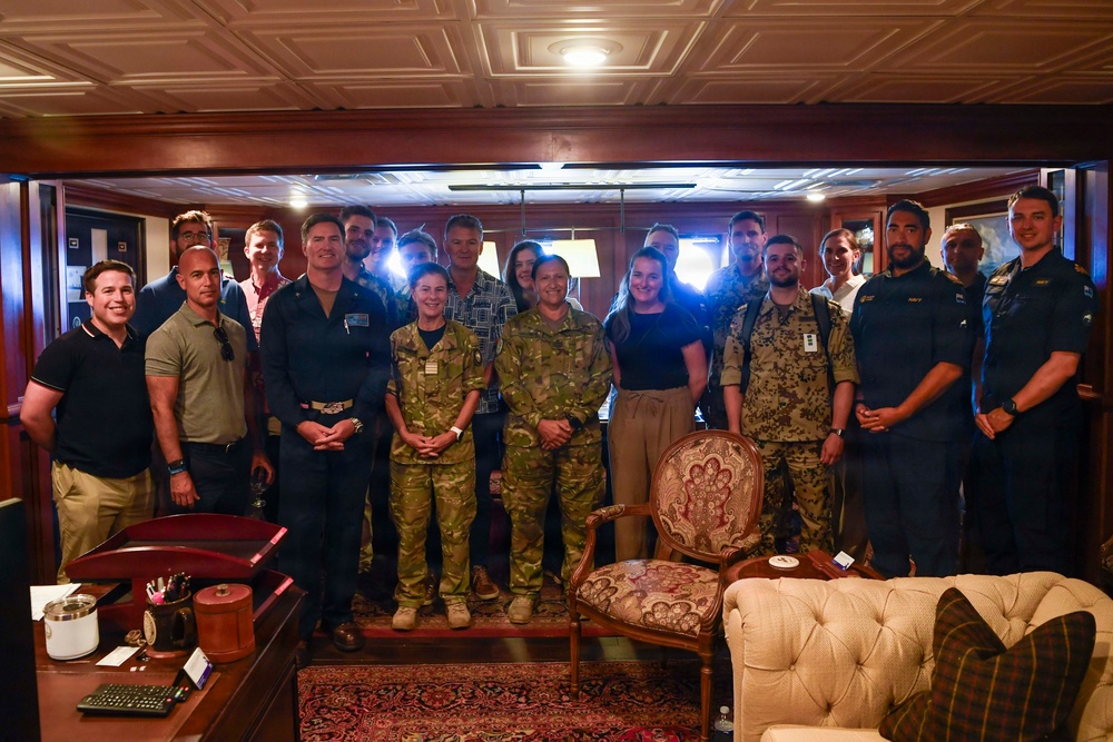 Allied military personnel visit USS Theodore Roosevelt during RIMPAC 26