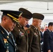 The command team pauses in remembrance