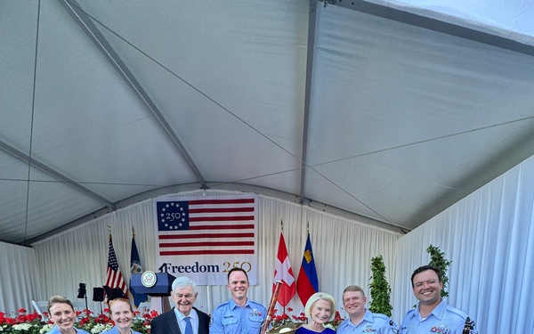 U.S. Air Forces in Europe Band takes photo with Callista and Newt Gingrich