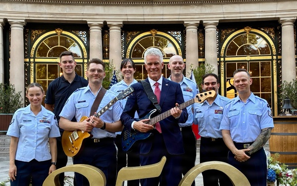U.S. Ambassador Merrick rocking with the U.S. Air Forces in Europe Band at his residence in Prague, Czech Republic