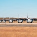 143d Airlift Wing conducts a 7-ship C-130J Hercules flyover