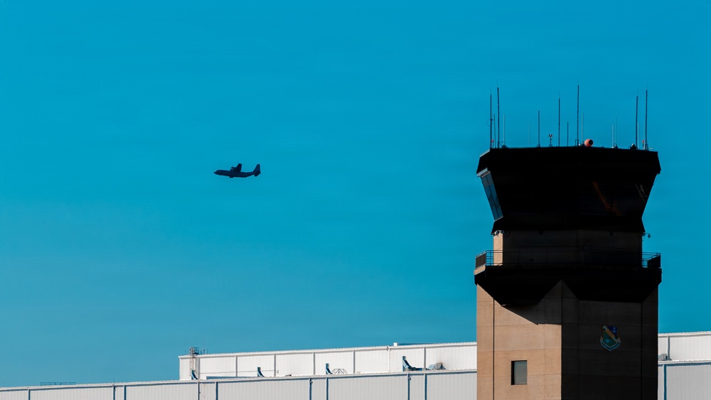 143d Airlift Wing conducts a 7-ship C-130J Hercules flyover