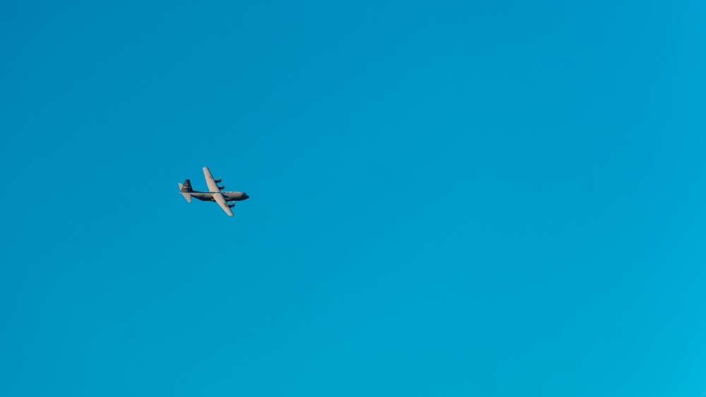 143d Airlift Wing conducts a 7-ship C-130J Hercules flyover
