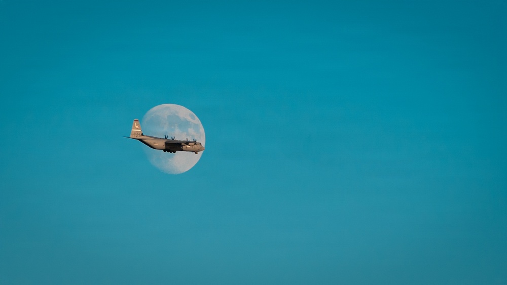 143d Airlift Wing conducts a 7-ship C-130J Hercules flyover