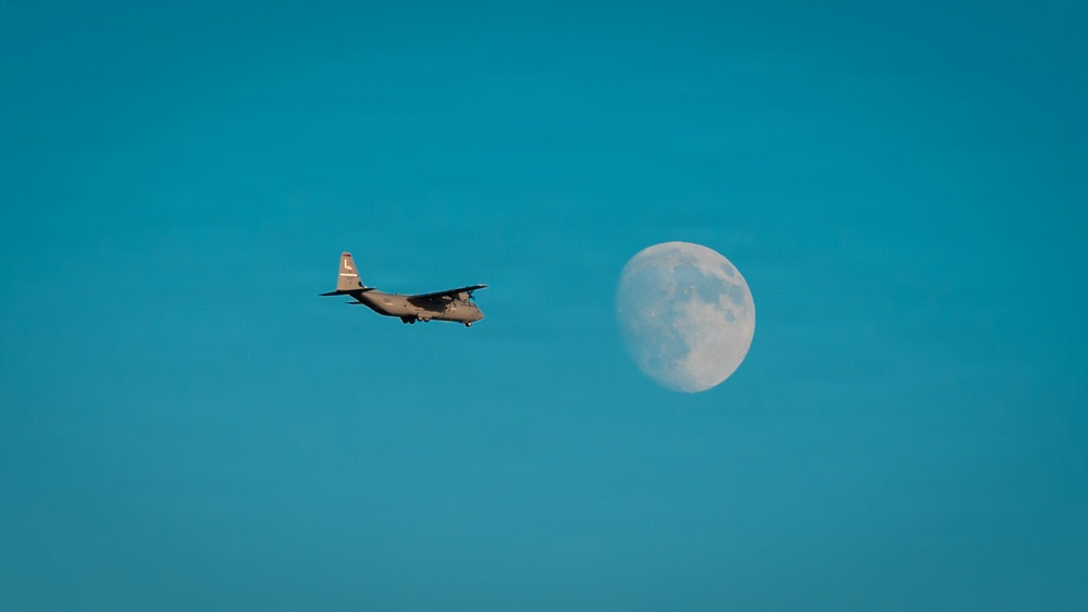 143d Airlift Wing conducts a 7-ship C-130J Hercules flyover