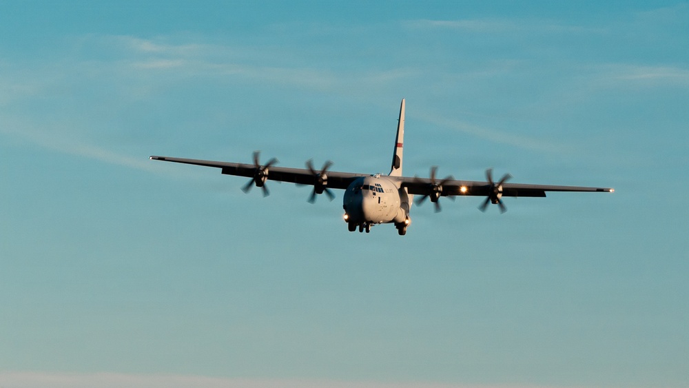 143d Airlift Wing conducts a 7-ship C-130J Hercules flyover
