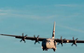 143d Airlift Wing conducts a 7-ship C-130J Hercules flyover