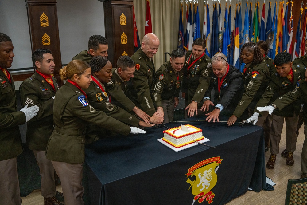 Cake Cutting at the Sergeant Morales Club Induction Ceremony