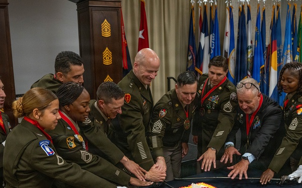 Cake Cutting at the Sergeant Morales Club Induction Ceremony