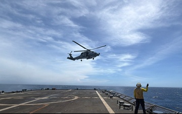 An MH-60R Seahawk helicopter, assigned to Helicopter Maritime Strike Squadron (HSM) 48, takes flight aboard the littoral combat ship USS Billings (LCS 15).