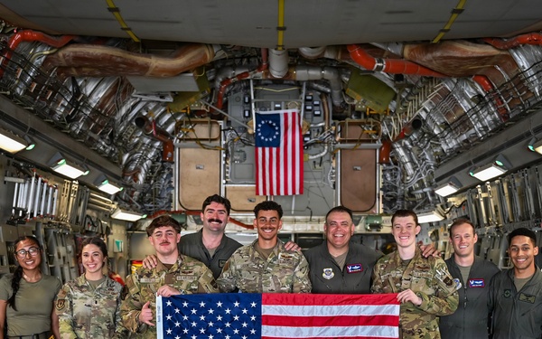 15th Airlift Squadron conducts Salute from the Shore flyover