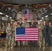15th Airlift Squadron conducts Salute from the Shore flyover