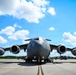 15th Airlift Squadron conducts Salute from the Shore flyover
