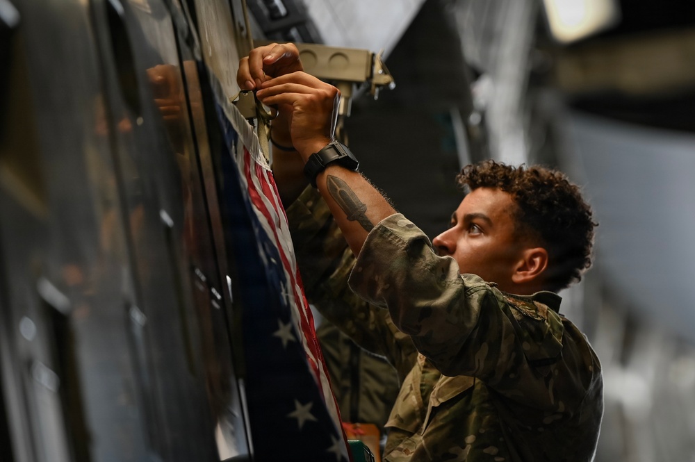 15th Airlift Squadron conducts Salute from the Shore flyover