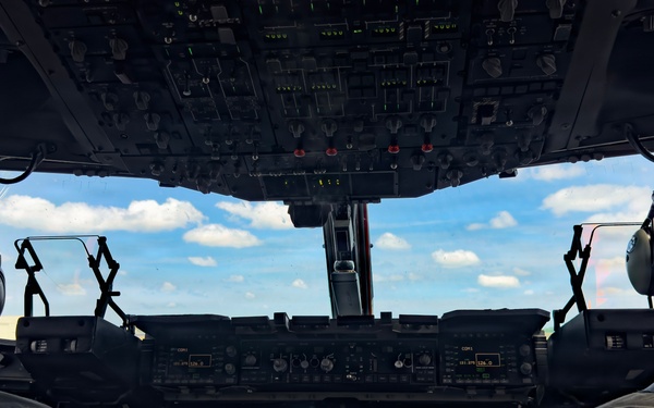 15th Airlift Squadron conducts Salute from the Shore flyover