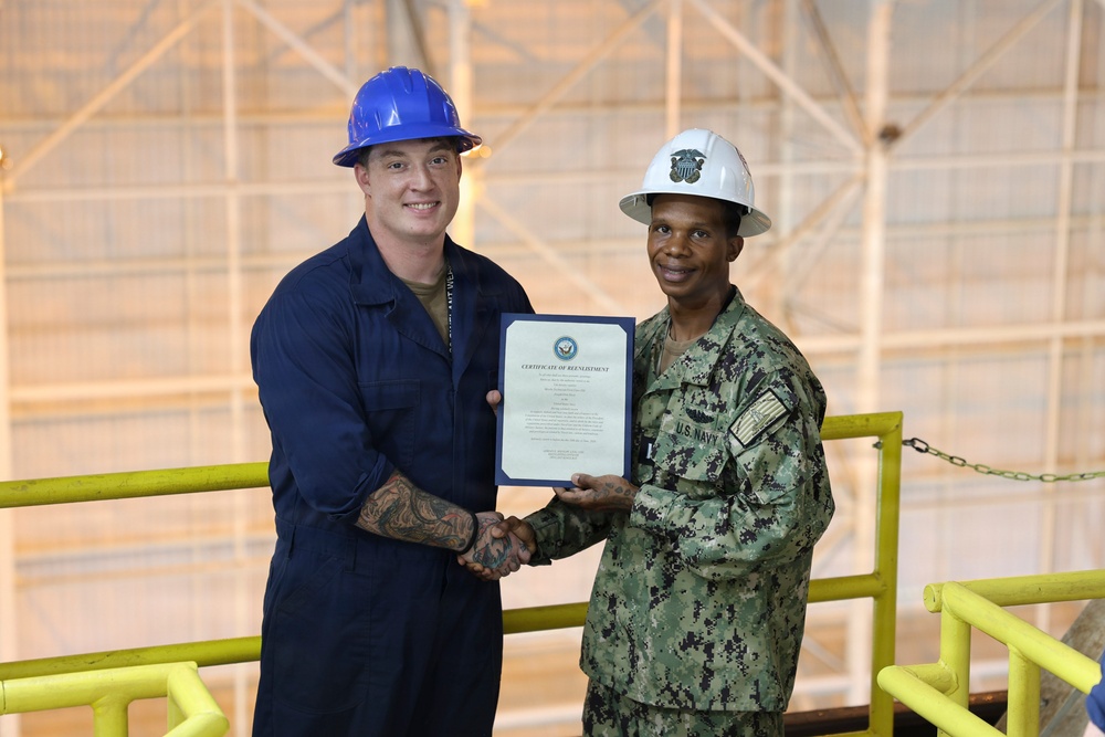 Missile Technician 1st Class Joseph Davis Reenlists