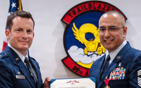 317th Airlift Wing changes responsibility between senior enlisted chief master sergeants