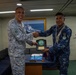 Philippine Navy contingent commander receives a memento from ARM Benito Juarez skipper during RIMPAC 26