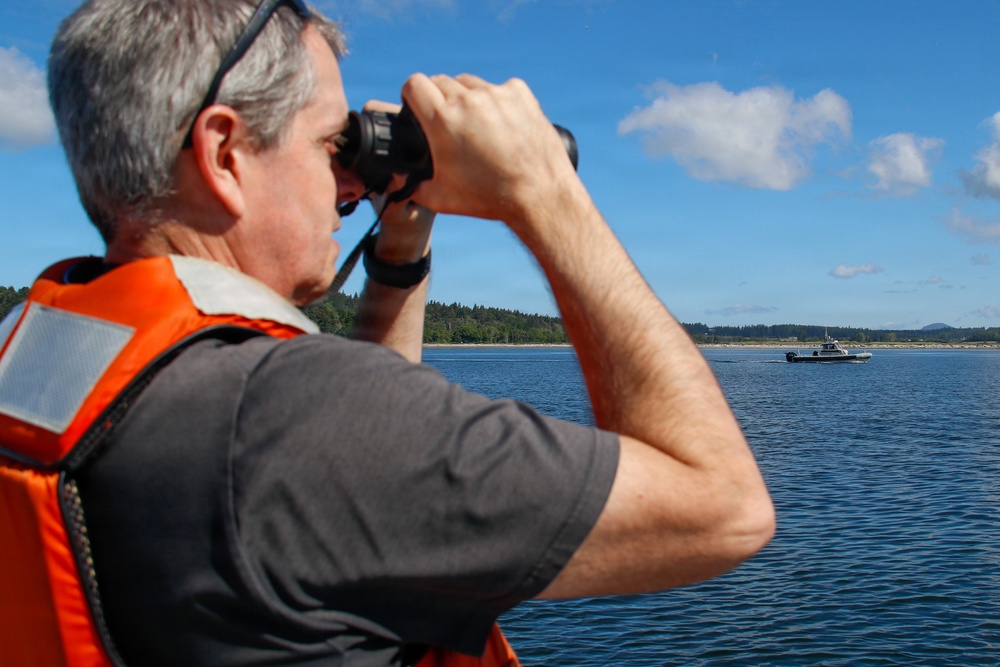 U.S. Navy wildlife monitoring survey team