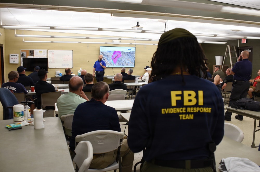 FBI New Orleans: Image of July 10th Briefing Supporting Baton Rouge Landfill Search