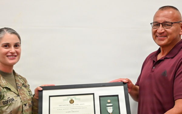 Tulsa District Commander presents public service medal to OHP retiree