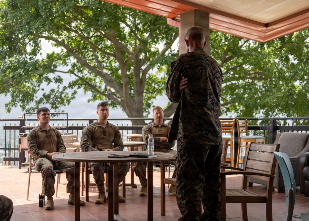 Maj. Gen. Jarrard Speaks With Marine at U.S. Embassy Caracas